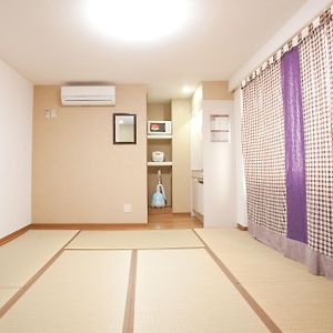 Kamer met Twee Aparte Bedden in Japanse Stijl